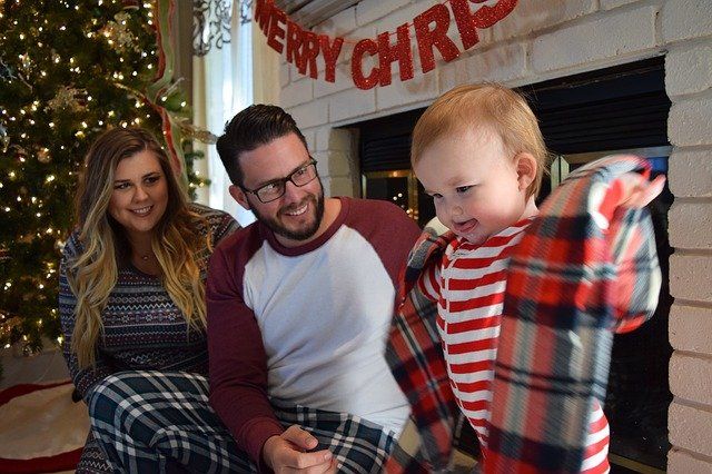 The best of all gifts around any Christmas tree: the presence of a happy family all wrapped up in each other. Bill Vaughn